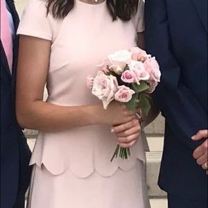This gorgeous light pink  dress is perfect for any occasion. Only worn once.